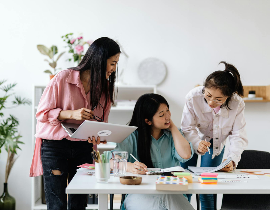 Team collaborating on social media strategy in a modern office