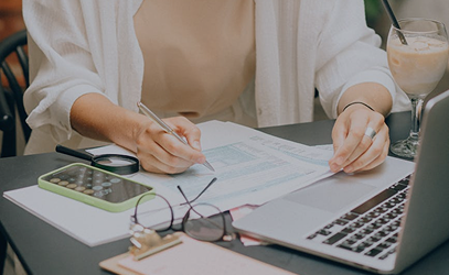 Campaign planning at a desk with laptop